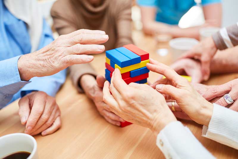 photo-of-hands-playing-blocks-dignity-quotient